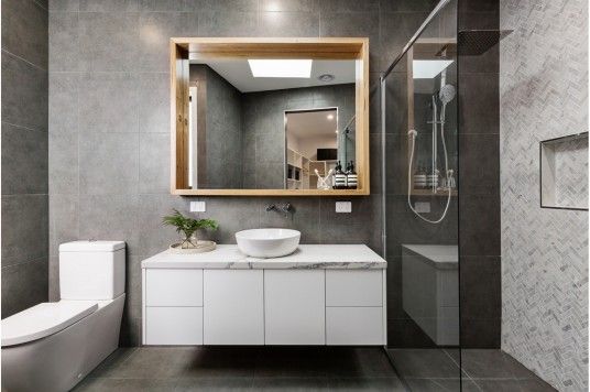 Modern bathroom joinery solutions with custom vanity, floating cabinets, and moisture-resistant finishes for Melbourne homes