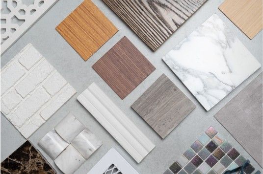 High-quality kitchen joinery materials including moisture-resistant plywood, 2-pack finishes, stone benchtops, and premium laminates