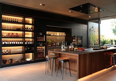 Smart kitchen storage and space-saving cabinet solutions featuring pull-out drawers, hidden organizers, and efficient layouts designed to maximize functionality in modern kitchens