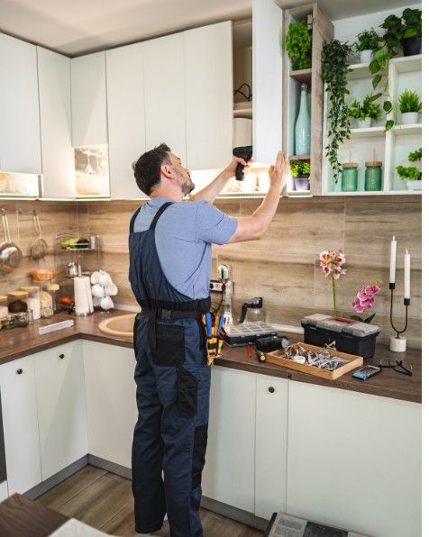 Best kitchen cabinet makers in Melbourne installing custom kitchen cabinets Melbourne in modern home