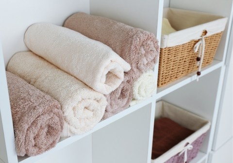 built in linen cabinet bathroom Melbourne with custom storage shelves and modern design